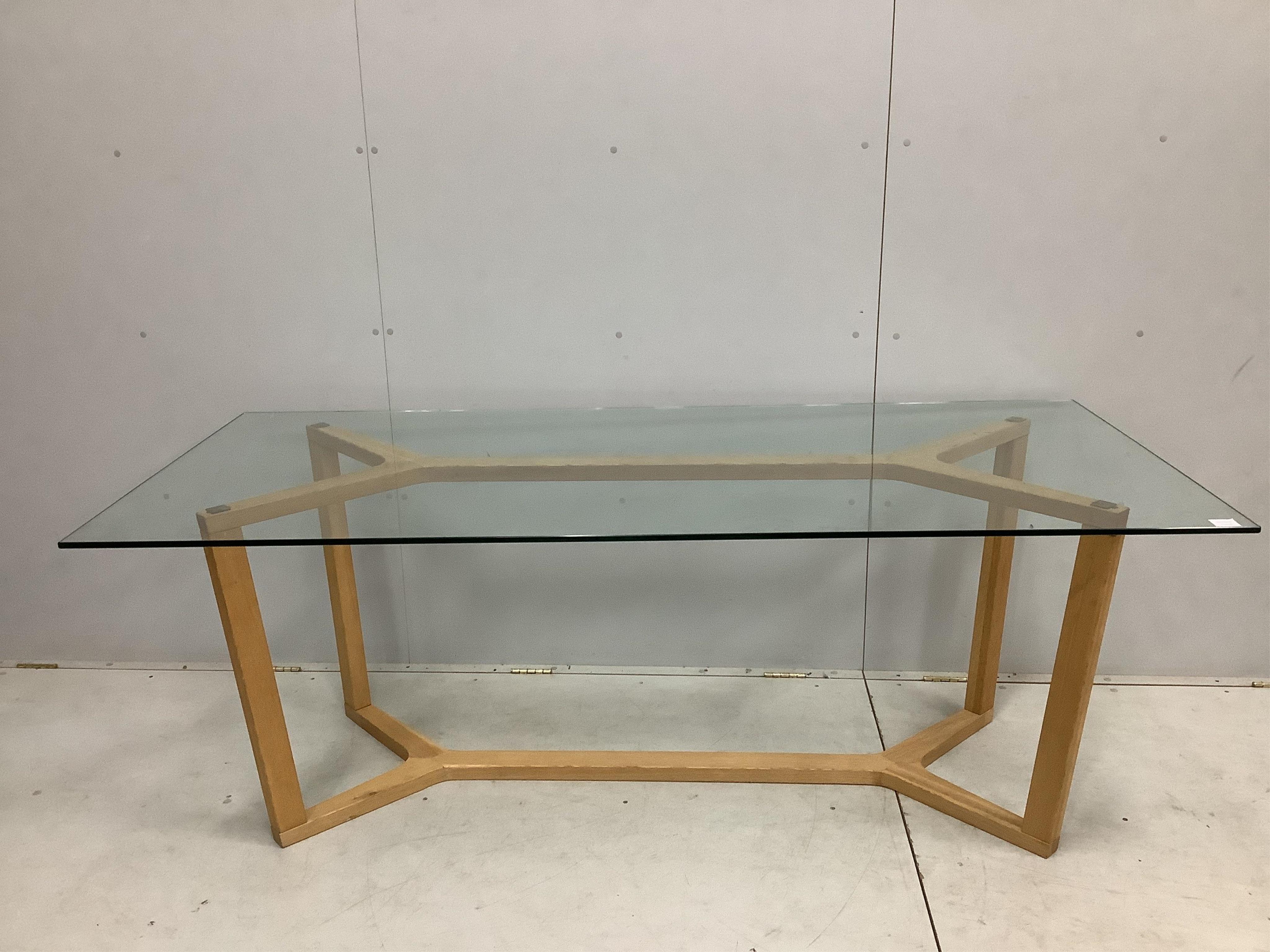 A Contemporary rectangular glass topped shaker style dining table on oak underframe, width 198cm, depth 89cm, height 72cm together with a matching bench seat